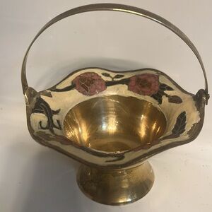 vintage Indian brass basket with painted floral decorations.